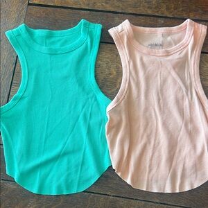 Set of Two Ribbed Tank Tops - Teal and Peach one is small one is xs